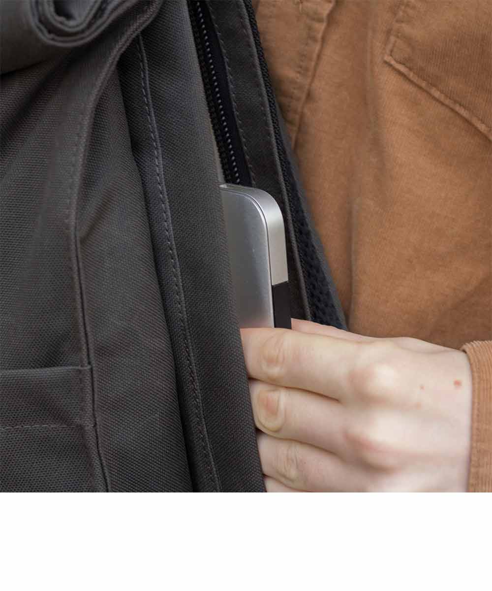 Property of Max reflective roll top backpack